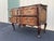 A fantastic two drawer walnut chest of drawers or commode dresser made by renowned American furniture maker, Baker...