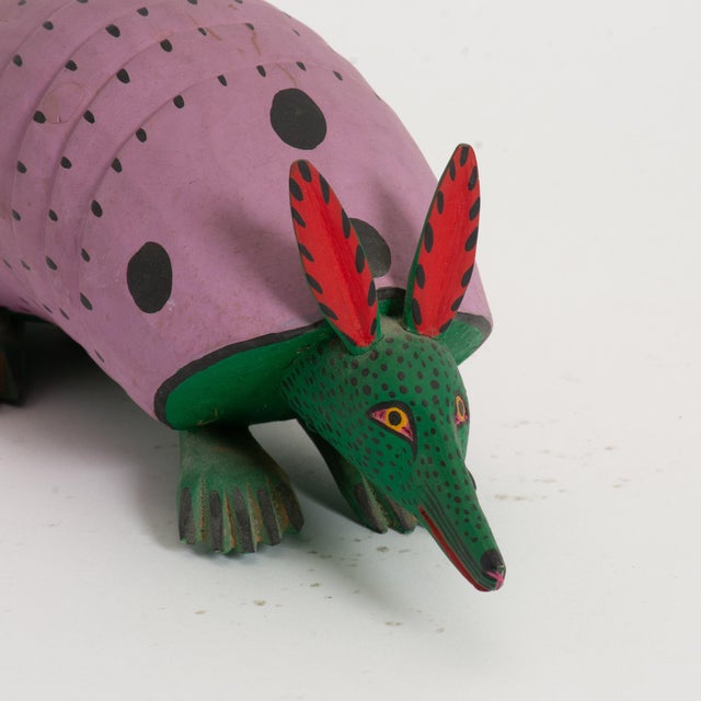 Fun folk art hand carved armadillo by the renowned Manuel Jimenez (1919-2005). 22" in length and 6" tall to the top of the...