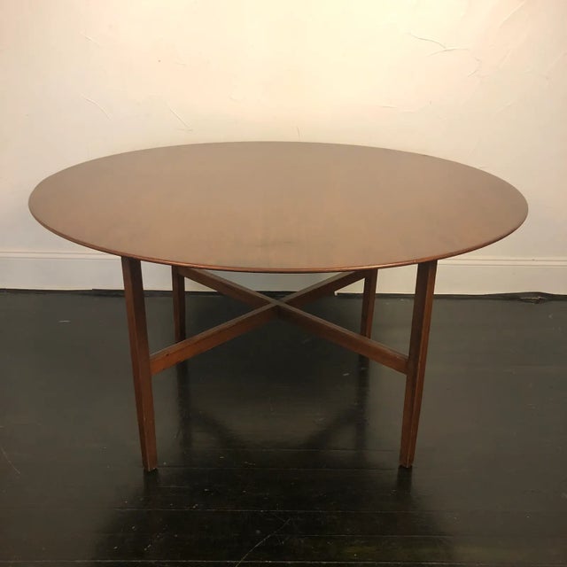 54 inch round solid walnut table by Florence Knoll. Original Knoll label intact as shown in photos. Original square walnut...