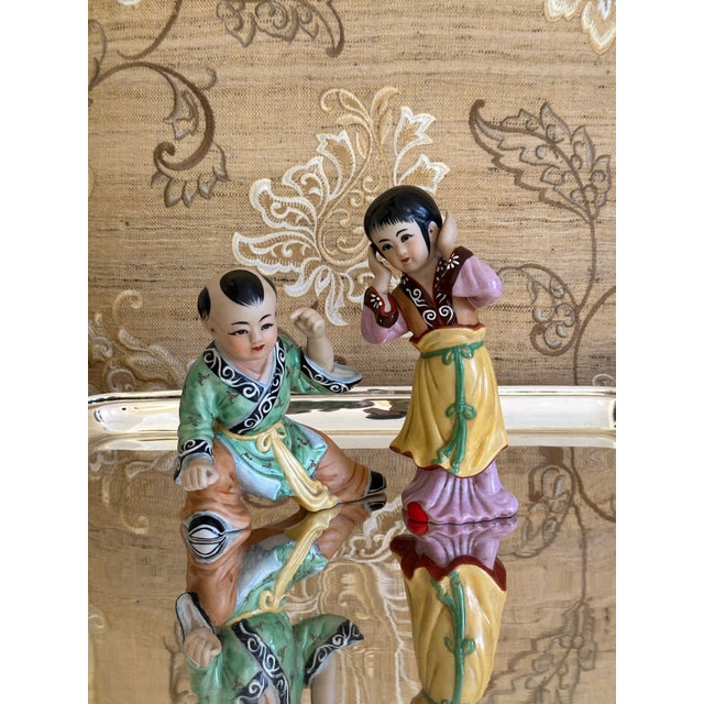 Vintage Wildwood Accents hand painted porcelain Chinese figurines. Female figurine: 6.25” tall x 3.25 wide elbow to elbow....