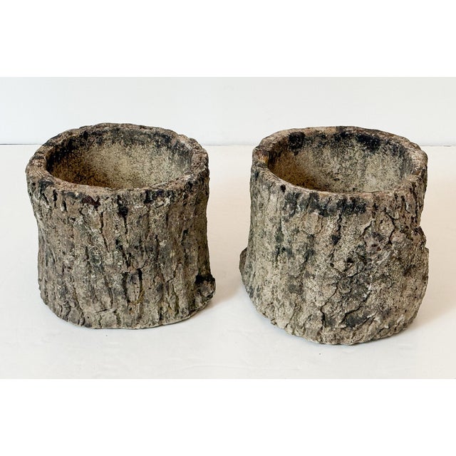 A fine French faux bois garden pot or planter urn of composition stone in the design of a gnarled hollow tree stump with...