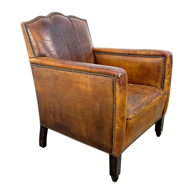Antique French Moustache Cognac Leather Club Chair, 1920s, in Good conditions. Designed 1920 to 1949