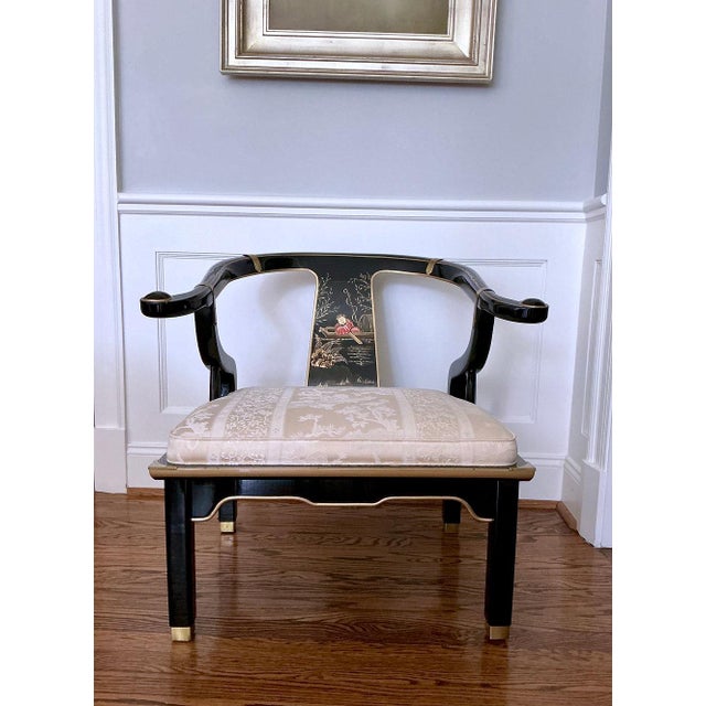 A stunning pair of James Mont style black lacquer Chinese horseshoe chairs with polychrome hand painted Asian scene splats...