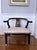 A stunning pair of James Mont style black lacquer Chinese horseshoe chairs with polychrome hand painted Asian scene splats...