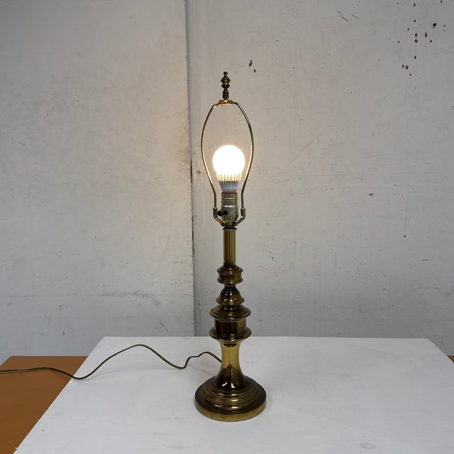 Design Plus Gallery presents a Vintage Brass Table Lamp from Stiffel. This table lamp showcases a solid brass body with a...