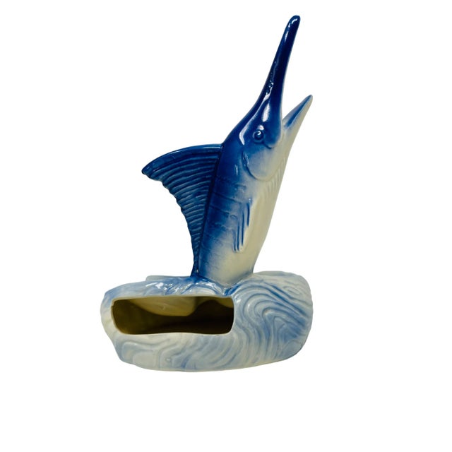 Introducing the Vintage Blue Marlin Ceramic Ashtray or Catchall – a timeless piece that combines functionality with a...