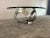 70s coffee table with brushed aluminum frame & massive glass plate. The table is in excellent condition. The table top is...