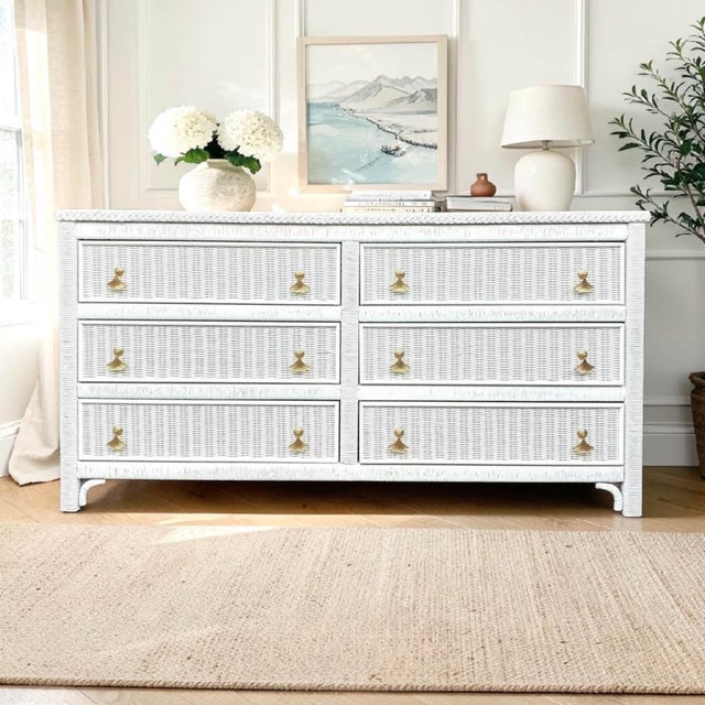 Bring timeless coastal elegance to your home with this beautiful Lexington Henry Link wicker bedroom set. This set...