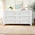Bring timeless coastal elegance to your home with this beautiful Lexington Henry Link wicker bedroom set. This set...