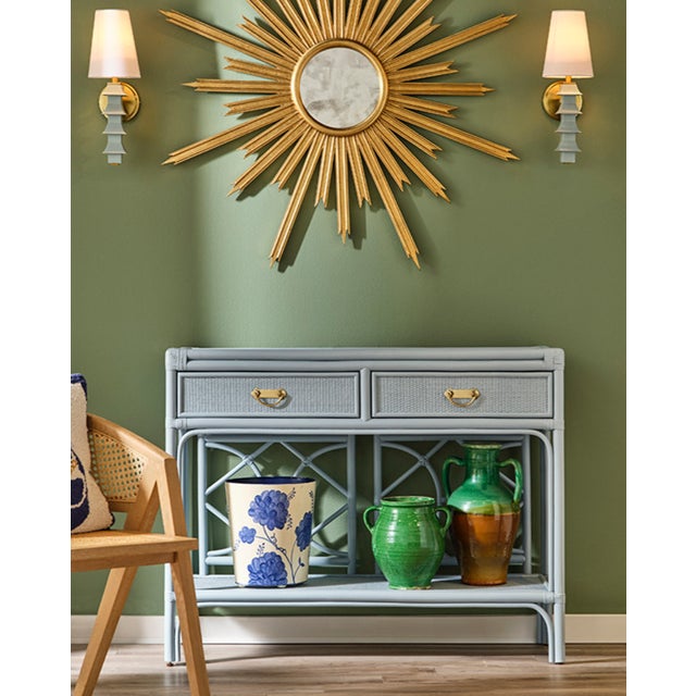 Introducing the Gideon Light Blue Two Drawer Console Table! With its unique rattan back design and light blue paint, this...