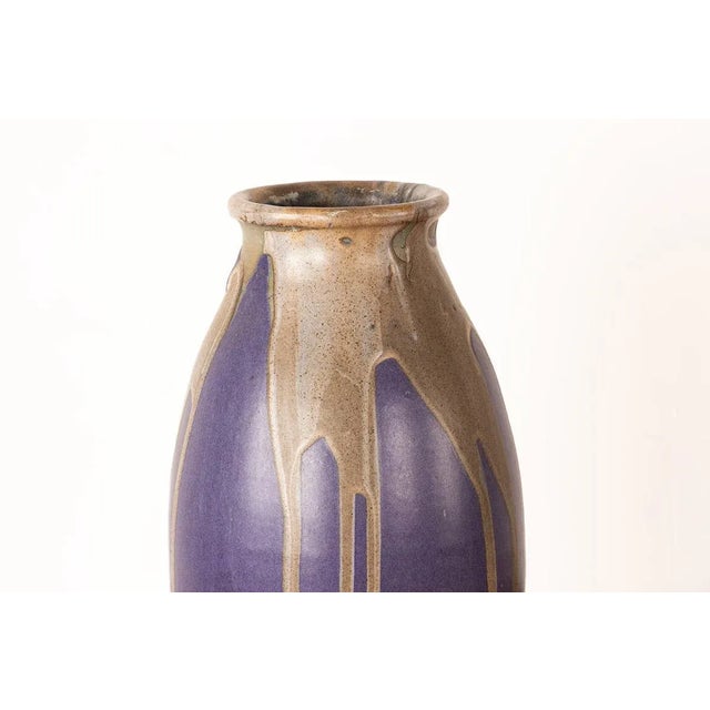 Diameter: 9 cm (neck) and 14 cm (max).