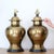 Set of two large MCM brass ginger jar lamps, in good overall condition. Both are in working condition. One of the lamps...