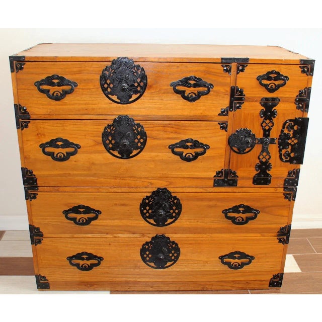 Bring timeless Japanese artistry and a touch of mystery into your home with this Antique Matsumoto Kasane Tansu, a...