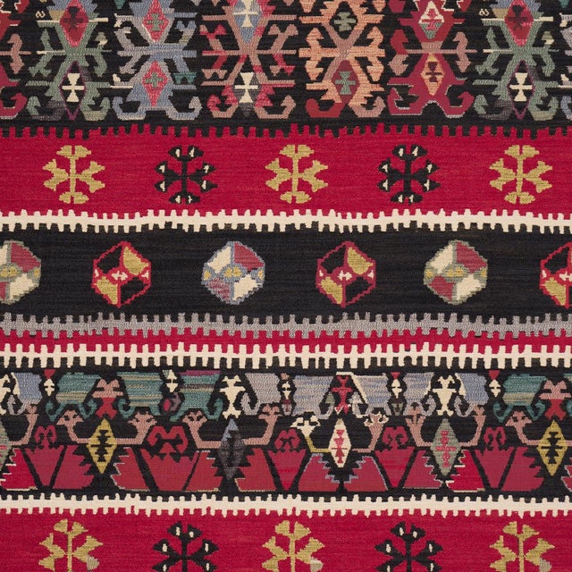 Fashion designer Johnson Hartig of Libertine was inspired by antique kilims when he created Sahane, a heavy jacquard weave...