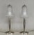 LORRAIN DAUM A pair of French art deco table lamps made circa 1926-1933. The nickel-plated bases in solid brass or bronze...