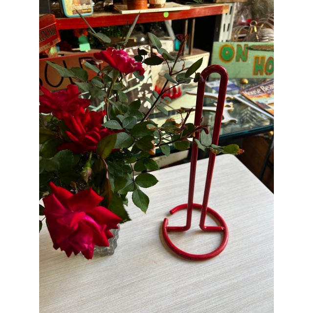 Up for consideration is a beautiful vintage red metal paper towel holder. This would look lovely in your home, and it is...