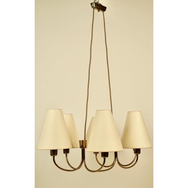 A rare version of the globe lamp, produced by j. T. Kalmar in the 1950's. What is unusual to the design is the canopy. The...