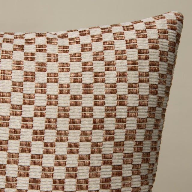 This pillow features Elkart with a knife edge finish. Elkhart is a soft, artisanal small woven check with a wonderfully...