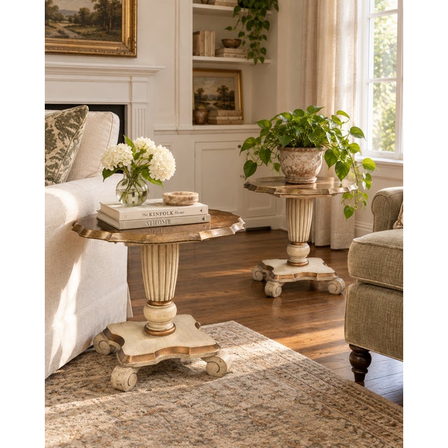 A decorative pair of vintage Katherine Henick side tables or plant stands, each featuring a scalloped gilt-finished top,...
