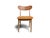 Set of eight mid-century Danish dining chairs handcrafted with solid oak frames, dramatic curved teak backrests. Newly...