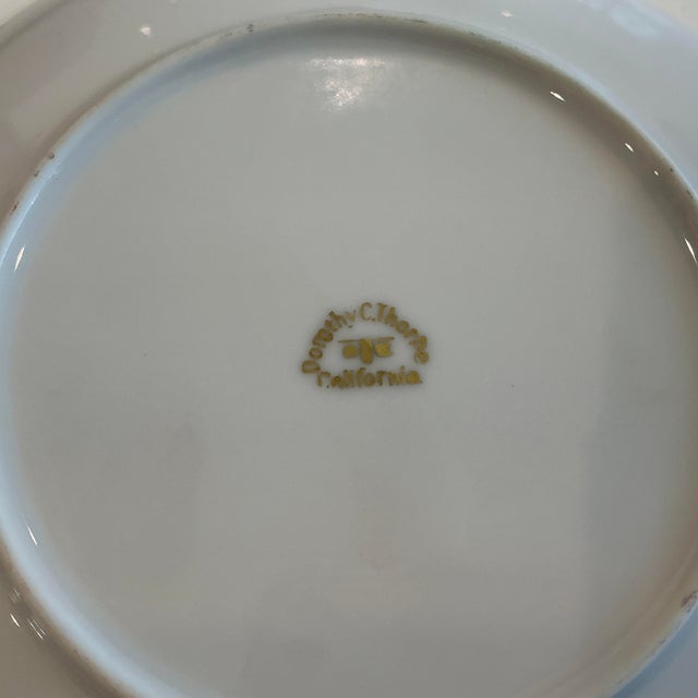 This vintage Dorothy Thorpe China set features a persimmon and gold color scheme with a round shape, perfect for special...