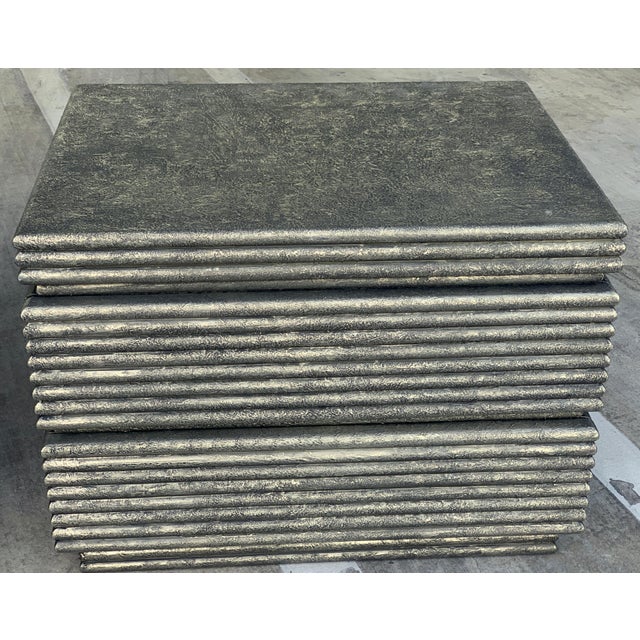 A pair of wonderful Vintage Brutalist nightstands or end tables that have been re-done and coated in textured metal by a...
