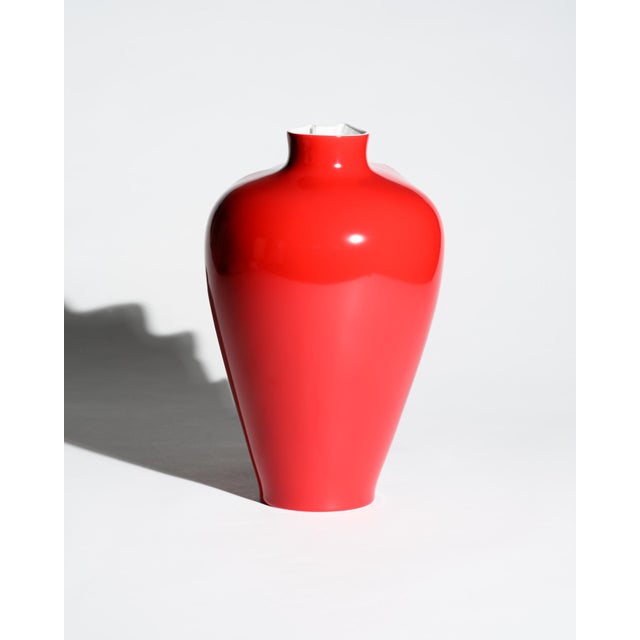 Glossy red porcelain “Fast” vase designed by Cédric Ragot for Rosenthal Studio-Line and issued as a limited edition in...