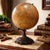 An authentic early-20th-century Cartocraft globe produced by the Denoyer-Geppert Company of Chicago, renowned for...