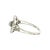 An Edwardian platinum hand-fabricated cocktail ring featuring 21 old mine-cut diamonds weighing approximately .35 carats....