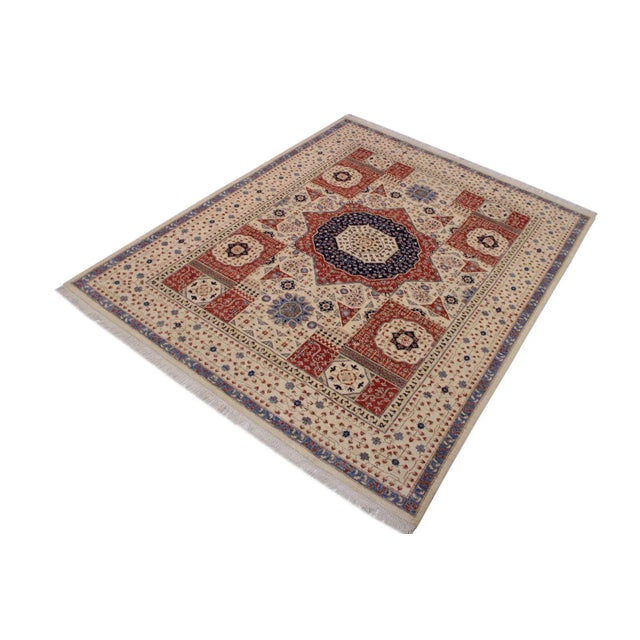 Designed with mesmerizing intricacy and gorgeous color palette, this hand-knotted masterpiece demonstrates the beauty and...