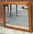A mid 19th Century Early American Style Solid Oak Frame Wall Mirror. Stained Oak. Measures 40" in width, 1" in depth and...