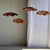 Very large flat, undulating leaf pendant light in teak with a floral, striated pattern. Elegant and decorative, organic...
