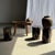 Side table in black petrified wood with beige star-shaped striations, H35 D24. Petrified wood is a fossilized wood (same...