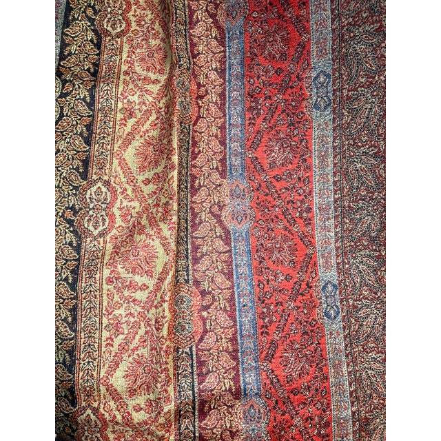 The Kasmir Paisley Floral Stripe Jacquard 100% Wool Decorative Throw is a medium-sized rectangular throw with a decorative...