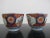Lovely Japanese Imari porcelain cup or bowl set with red, blue, green, and gold floral design. Each measures 2 1/2" tall x...