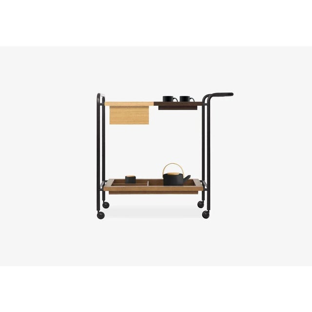 Tea trolley composed of 1 lacquered steel structure and 3 tops in solid oak wood and MDF veneered with natural oak leaf....