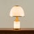 This elegant and sculptural table lamp was designed by romeo rega and manufactured in italy during the 1980s by f. Fabbian...