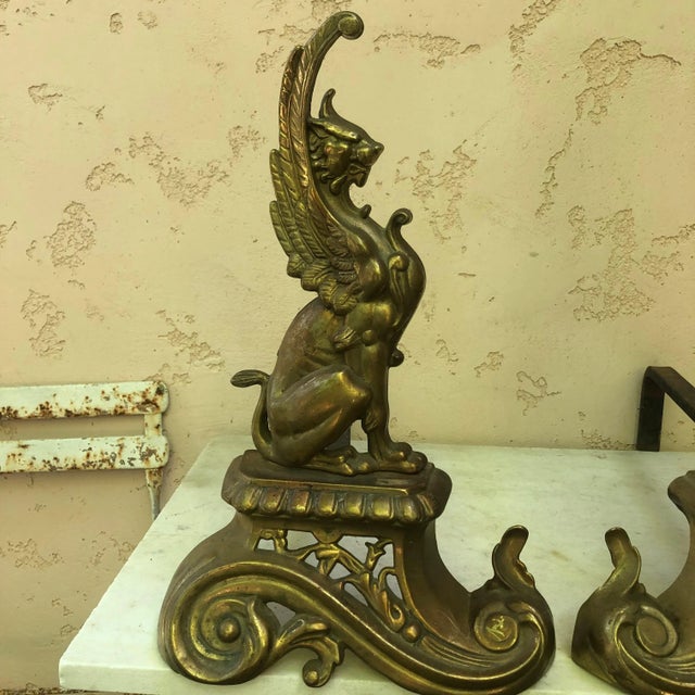 Pair of French brass andirons neoclassical with sphynges, circa 1880. Measures: 11.5" L x 18" W x 17.5" H.