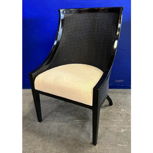 Dark Walnut Finish on Walnut with Matching Caning. Upholstered in Clarence House 34082-1. From the Madeline Stuart...