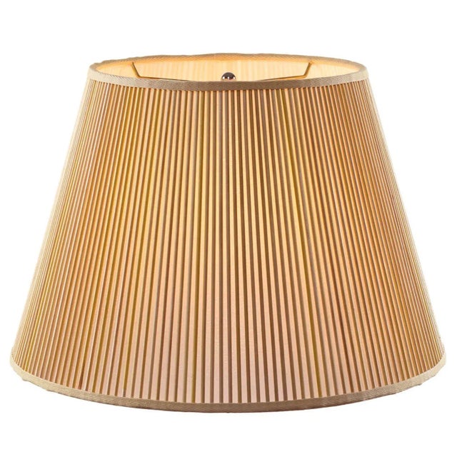 Yellow washed sticks are added by hand, one at a time, over artisanal, vellum paper. This Stick Shade will add charm to...