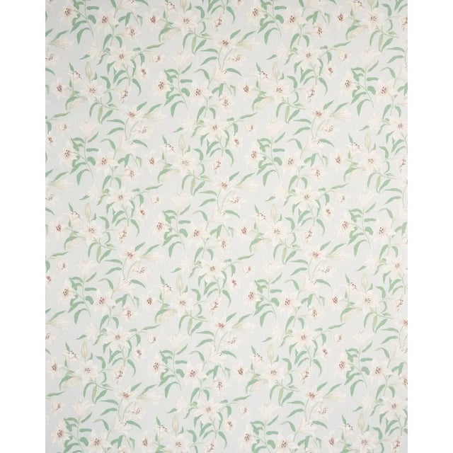 Brilliant petals pop against the linen ground of Scattered Lilies, a tossed floral pattern. Designed by Miles Redd, this...