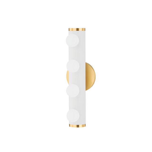 Penny gives familiar Hollywood-style lighting a fresh feel. Small opal matte globes spread across a cylinder of textured...