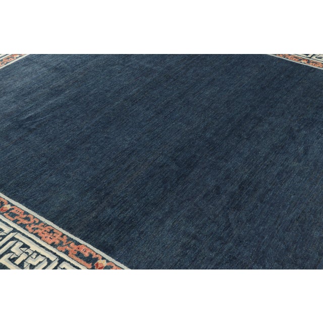 Hand-knotted in wool, this 8x9 Modern Classics rug by Rug & Kilim enjoys an open field design and geometric border...