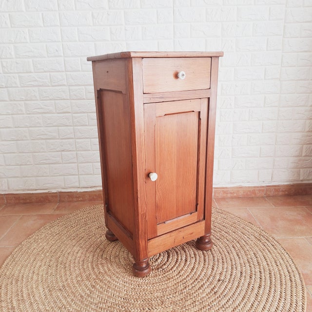 Early 20th century Spanish Arts & Crafts small wooden cabinet or nightstand, featuring a single drawer on top and a...