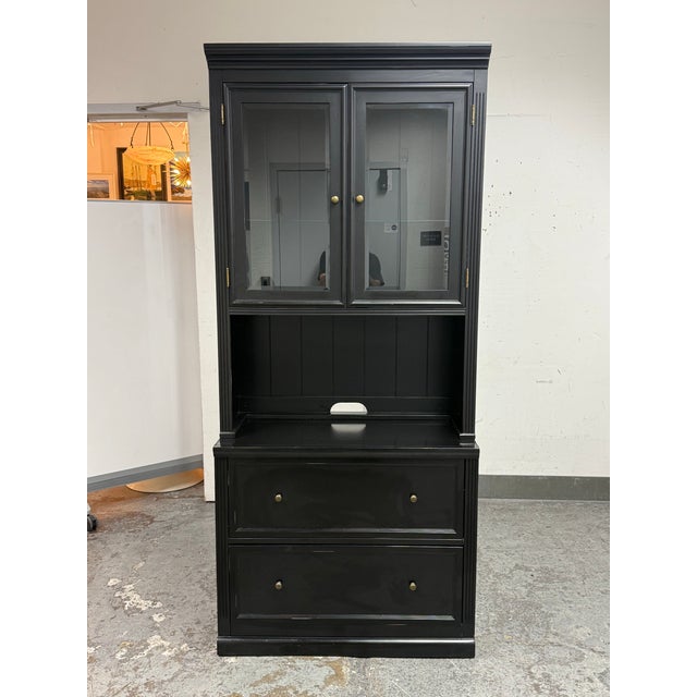 Design Plus Gallery presents a Tuscan File Console + Hutch from Ballard Designs. This two-piece storage cabinet pairs...