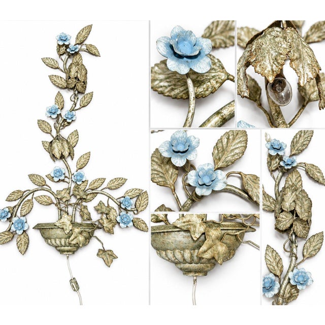 This decorative wall light has a distinctly vintage Italian botanical design, likely inspired by Florentine metalwork of...
