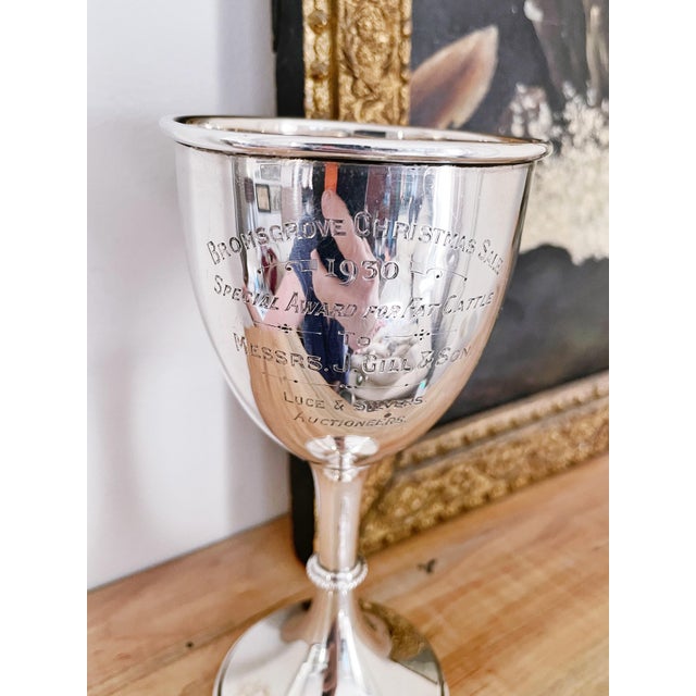 A lovely antique circa 1930 solid sterling silver trophy cup, awarded at a Christmas sale sale for fat cattle! The...