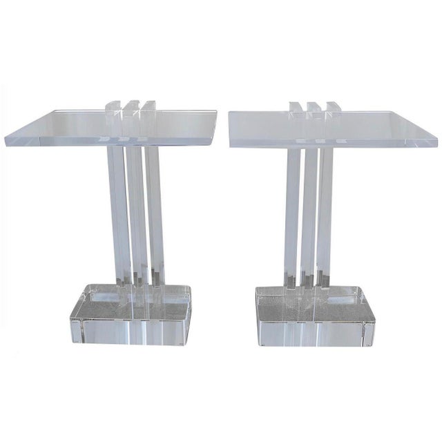 A sleek and sculptural pair of vintage acrylic side tables by Les Prismatiques, crafted in the U.S.A during the 1970's....