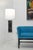 Enhance your home with a beautiful pair of black and white veined marble block table lamps by Nessen Studio, exclusively...
