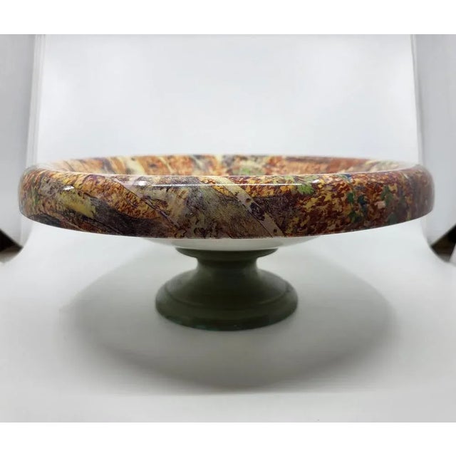 Discover this large Maison Lancel bowl in French ceramic, a true jewel of 1980s craftsmanship. with a diameter of 38 cm...